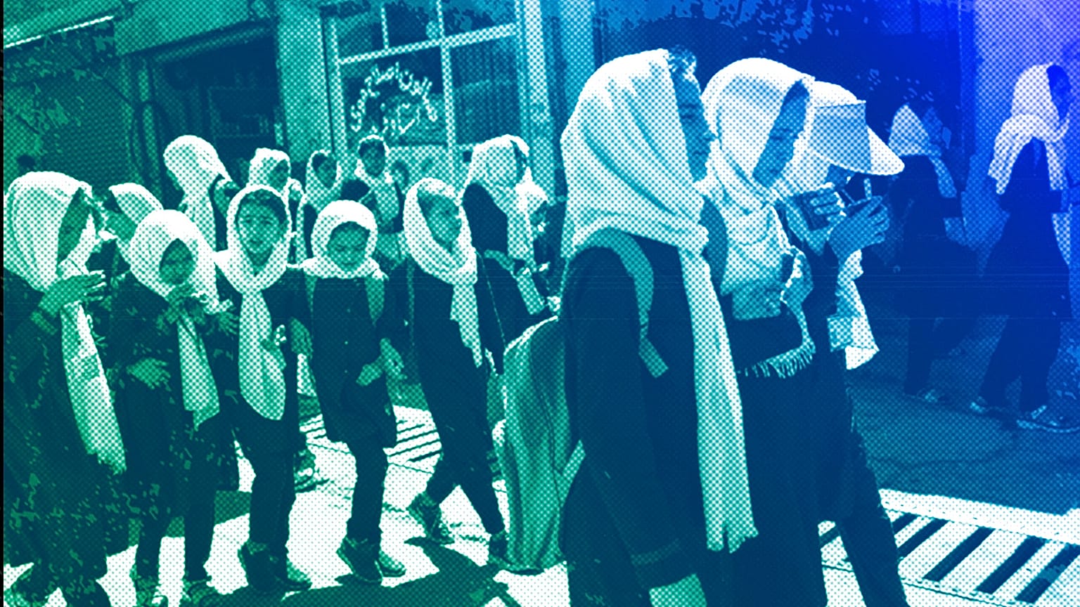 Students walk together from school in Kabul, June 2023