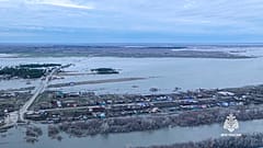 Grab taken from video released by the Russian Emergency Ministry Press Service on Tuesday, April 16, 2024, shows flooded area at Tobol river in the Kurgan region, Russia. 