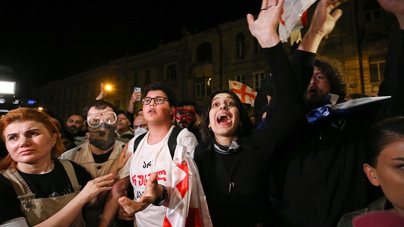 Demonstrator shouts during a rally outside the parliament building in Tbilisi, Georgia, on Thursday, April 18, 2024, to protest against "the Russian law"