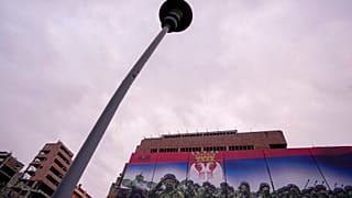 A huge billboard that shows Serbian soldiers and reads: "We serve Serbia!" displayed on the former Serbian army headquarters