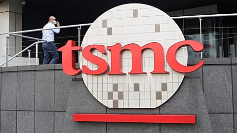 A person walks into the Taiwan Semiconductor Manufacturing Co., Ltd. (TSMC) headquarters in Hsinchu, Taiwan on Oct. 20, 2021. 