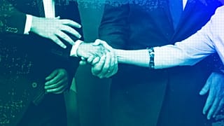European Commission President Ursula von der Leyen and other European leaders shake hands prior to a meeting at EU headquarters in Brussels, July 2022