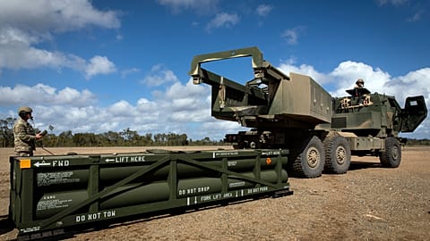 FILE PHOTO - In this image provided by the U.S. Army, Army Tactical Missile System (ATACMS) on to the High Mobility Artillery Rocket System (HIMARS) in Queensland, Australia.
