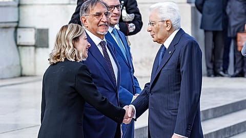Italy's Prime Minister Giorgia Meloni shakes hands with President Sergio Mattarella at 79th anniversary of Liberation Day (Roberto Monaldo/LaPresse via AP)