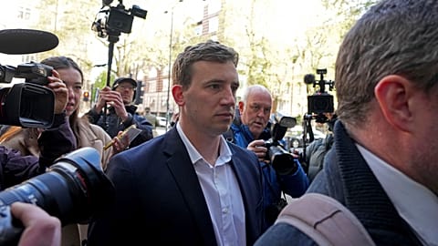 Former British parliamentary researcher Christopher Cash arrives at Westminster Magistrates' Court in London, Friday April 26, 2024.