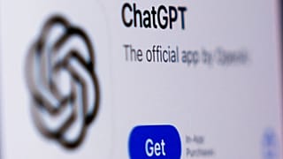 A ChapGPT logo is seen on a monitor.