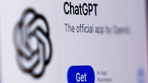 A ChapGPT logo is seen on a monitor.