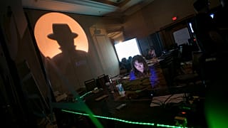 A Black Hat tech associate works in the network operating center (NOC) during the Black Hat information security conference at Mandalay Bay, Wednesday, July 26, 2017