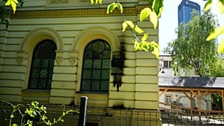 Fire damage on the façade of the Nożyk Synagogue in Warsaw, Poland.