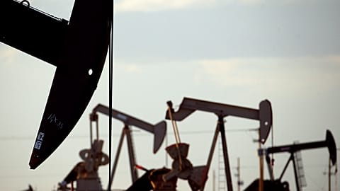 Pump jacks work in a field near Lovington, New Mexico in this file photo