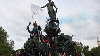 Thousands of protesters marched through the French capital, seeking better pay and working conditions. 
