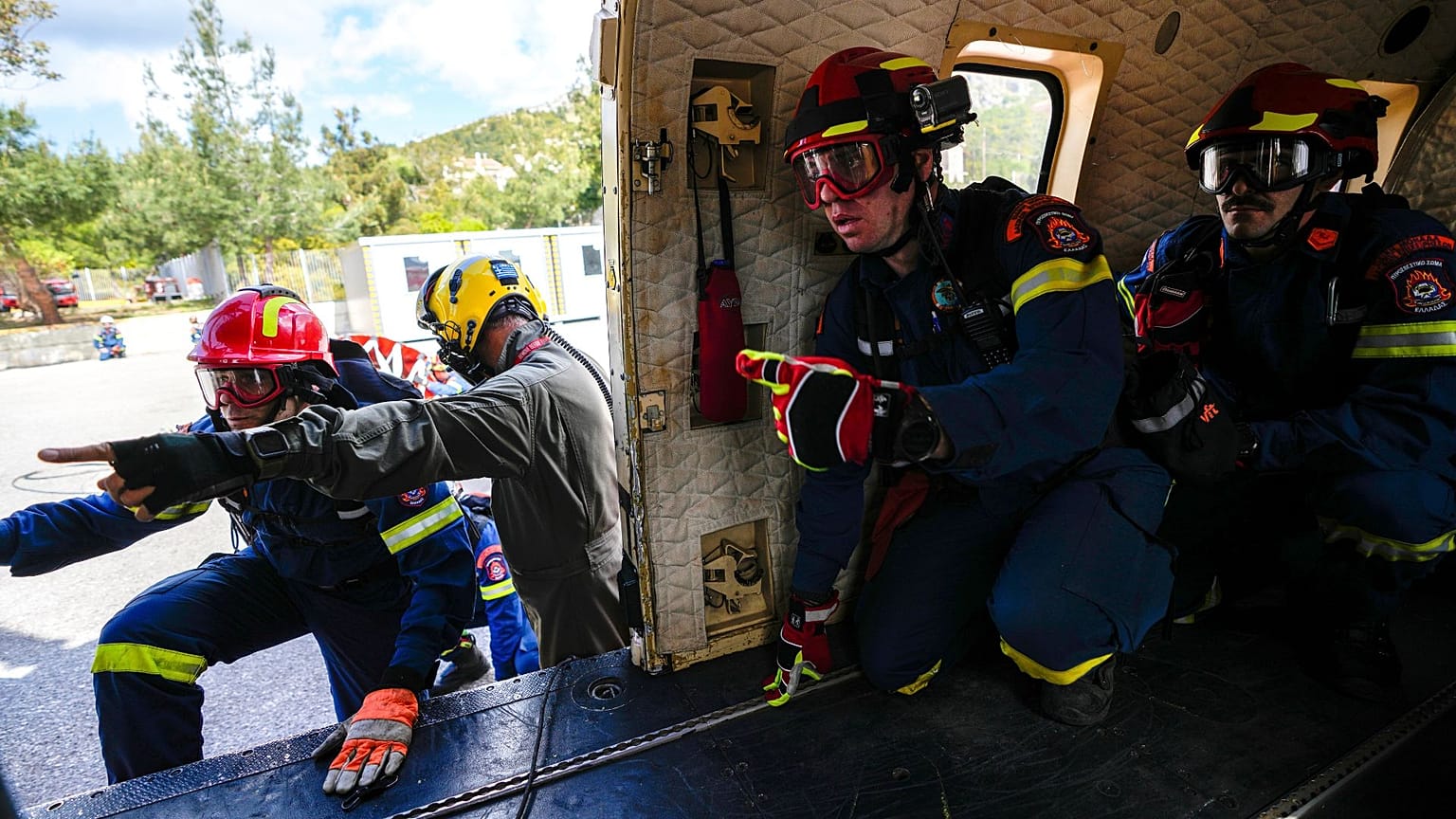 Firefighters of the 1st Wildfire Special Operation Unit take part in a drill in Villia village, 60 kilometres northwest of Athens, Greece, 19 April 2024. 