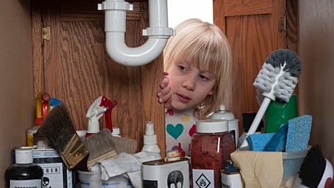 One of the top causes of poisonings among children is access to household cleaning products.