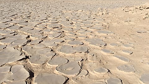 The desert landscape of the Yungay Playas with the typical pattern of parched ground.
