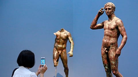 A sculpture titled "Statue of a Victorious Youth, 300-100 B.C." at the J. Paul Getty Museum in Los Angeles, on 27 July 2015