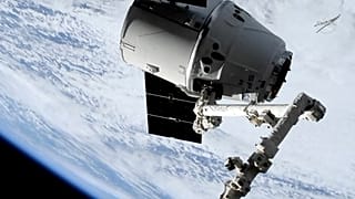 In this image taken from NASA Television, a SpaceX shipment prepares to arrive at the International Space Station following a weekend launch, Monday, May 6, 2019.