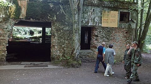 Tourists visit the ruins of Adolf Hitler's headquarters the "Wolf's Lair" in Gierloz, northeastern Poland.