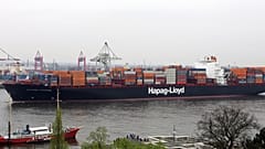 A ship arrives at the port of Hamburg, Germany