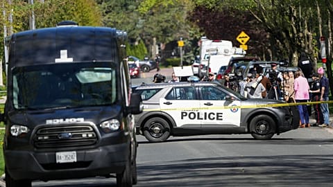 Media wait for a press conference as Toronto Police investigate a shooting outside rap mogul Drake's mansion in Toronto's Bridle Path neighborhood. 