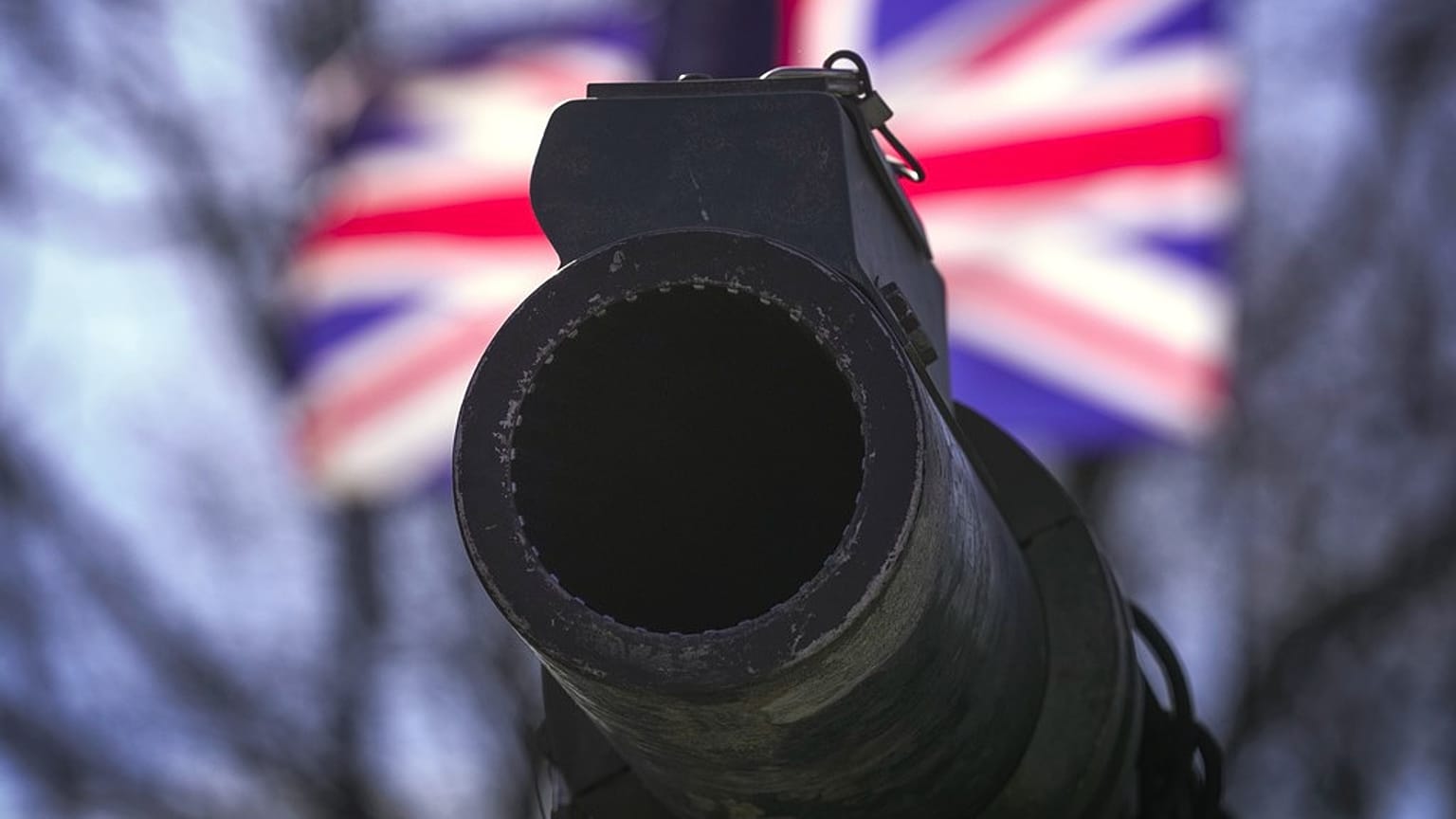 A cannon in front of a UK flag during a celebration of the 20th anniversary of Estonia's NATO membership. Tallinn, Estonia, April 4, 2024.