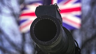 A cannon in front of a UK flag during a celebration of the 20th anniversary of Estonia's NATO membership. Tallinn, Estonia, April 4, 2024.
