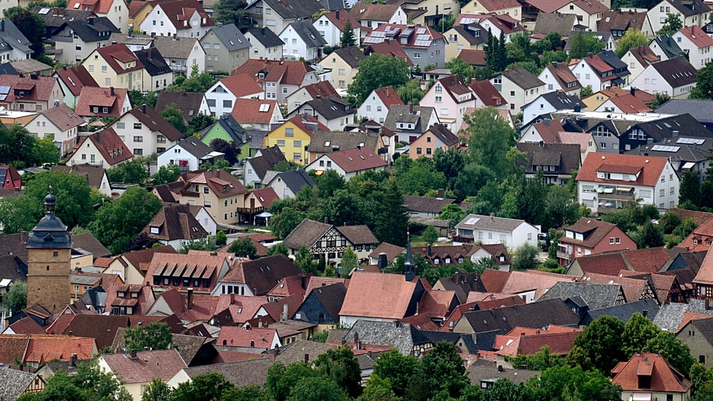 Residential houses in the town of Bad Staffelstein are pictured from the Staffelberg hill in Germany