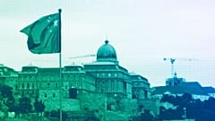 A Chinese national flag with the Buda Castle in the background waves in Budapest, May 2024