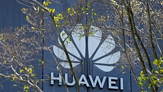 The Huawei brand logo is seen on a building in the sprawling Huawei headquarters campus in Shenzhen, China, Saturday, Sept. 25, 2021.