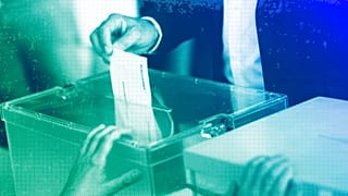 A person casts their ballot in Madrid, May 2023
