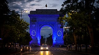 The Arc de Triomphe is illuminated in the EU colors to mark Europe Day, in Bucharest, Romania, Thursday, May 9, 2024