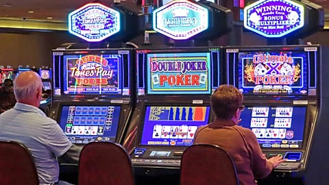 Gamblers play slot machines at Harrah's casino in Atlantic City N.J., on Sept. 29, 2023. 