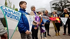 People demonstrate outside the European Court of Human Rights.