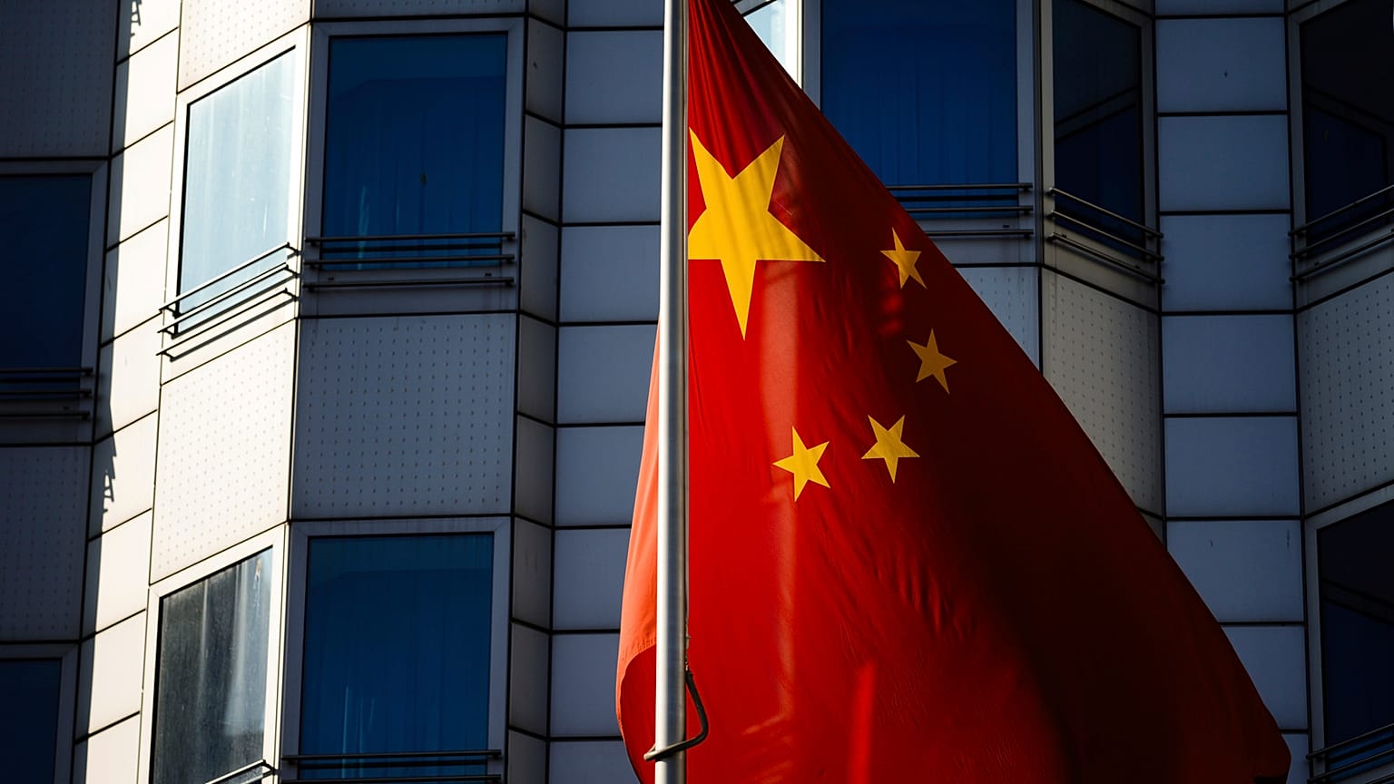 The Chinese national frag waves in front of the country's embassy in Berlin, Tuesday, April 23, 2024. 
