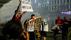 Police use water cannon to disperse anti-government demonstrators in Tel Aviv, May 11th 2024