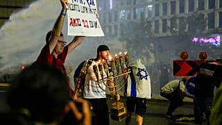 Police use water cannon to disperse anti-government demonstrators in Tel Aviv, May 11th 2024