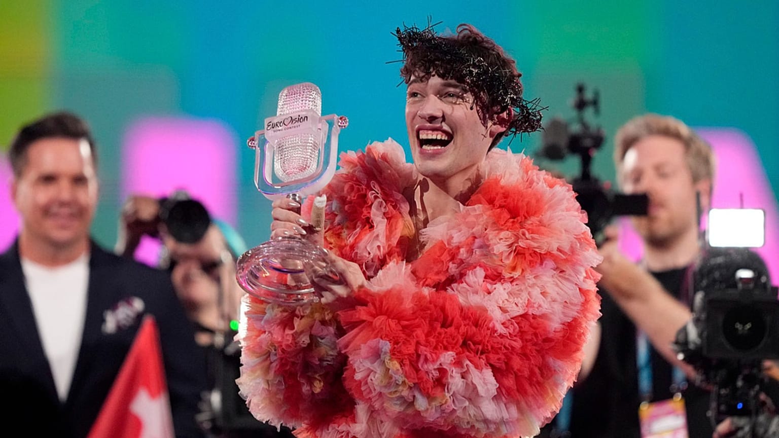 Nemo of Switzerland, who performed the song The Code, celebrates after winning the Grand Final of the Eurovision Song Contest in Malmo, Sweden, Sunday, 12 May 2024.