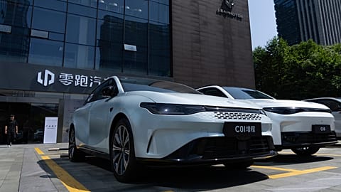 Leapmotor vehicles are parked outside a showroom in Hangzhou in eastern China's Zhejiang province on Tuesday, May 14, 2024.