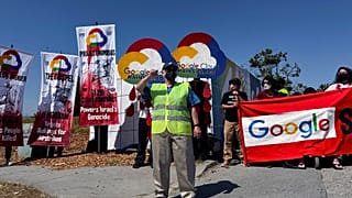 Demonstrators hold signs in protest as they block an entrance to the Google I/O conference in Mountain View, Calif. on Tuesday, May 14, 2024. 