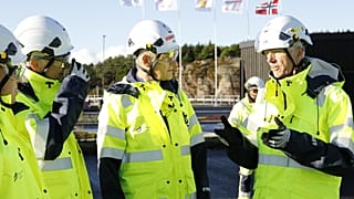 Norwegian Prime Minister Jonas Gahr Støre (centre) tours the Northern Lights CCS project site in 2022 after opening a visitor centre.