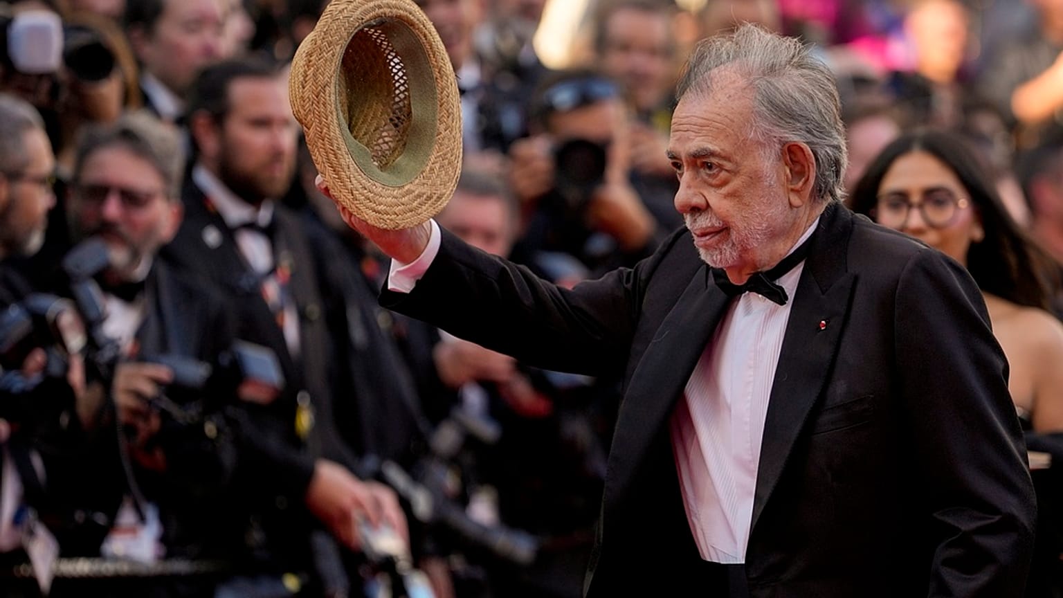 Director Francis Ford Coppola poses for photographers upon arrival at the premiere of the film 'Megalopolis' 