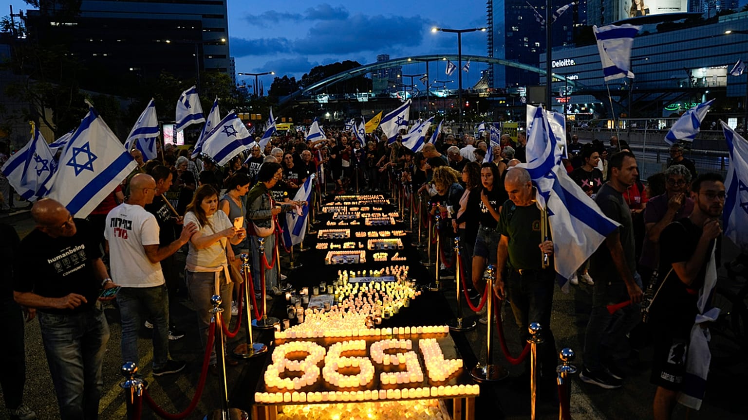 People protest against Israeli Prime Minister Benjamin Netanyahu's government and call for the release of hostages, in Tel Aviv, Israel, Saturday, May 11, 2024. 