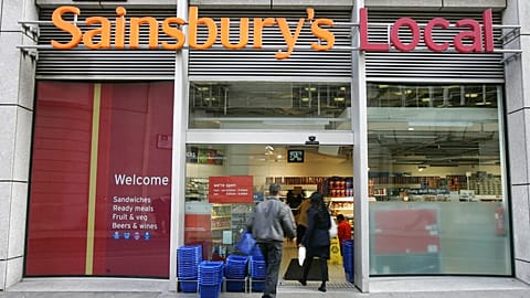 The company logo for the Sainsbury's food store chain at their Holborn building in London, Monday Nov. 20, 2006. (AP Photo/Alastair Grant)