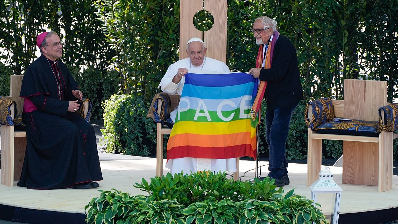 Pope Francis is offered a 'peace flag' during the 'Arena of Peace - Justice and Peace Will Embrace' meeting in Verona, Italy, Saturday, May 18,2 2024.