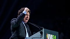 Argentina's president Javier Milei gestures as he delivers a speech on stage during the Spanish far-right wing party Vox's rally "Europa Viva 24" in Madrid, Spain, Sunday, May
