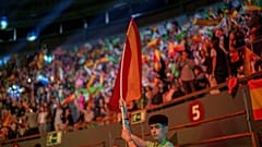 A supporter holds a Spansh flag during the Spanish far-right wing party Vox's rally "Europa Viva 24" in Madrid, Spain, Sunday, May 19, 2024.