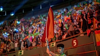 A supporter holds a Spansh flag during the Spanish far-right wing party Vox's rally "Europa Viva 24" in Madrid, Spain, Sunday, May 19, 2024.