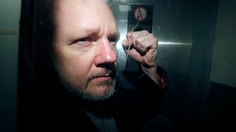 WikiLeaks founder Julian Assange being taken from court.
