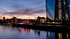 Colourful lights burn in the window of a restaurant near the European Central Bank, right, in Frankfurt, Germany, late Friday, May 3, 2024.