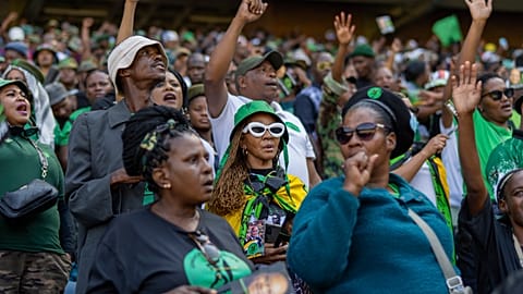 Supporters wait for former South African President Jacob Zuma to arrive at Orlando stadium in the township of Soweto.