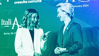 Italian Premier Giorgia Meloni shares a light moment as she welcomes European Commission President Ursula von der Leyen in Rome, January 2024